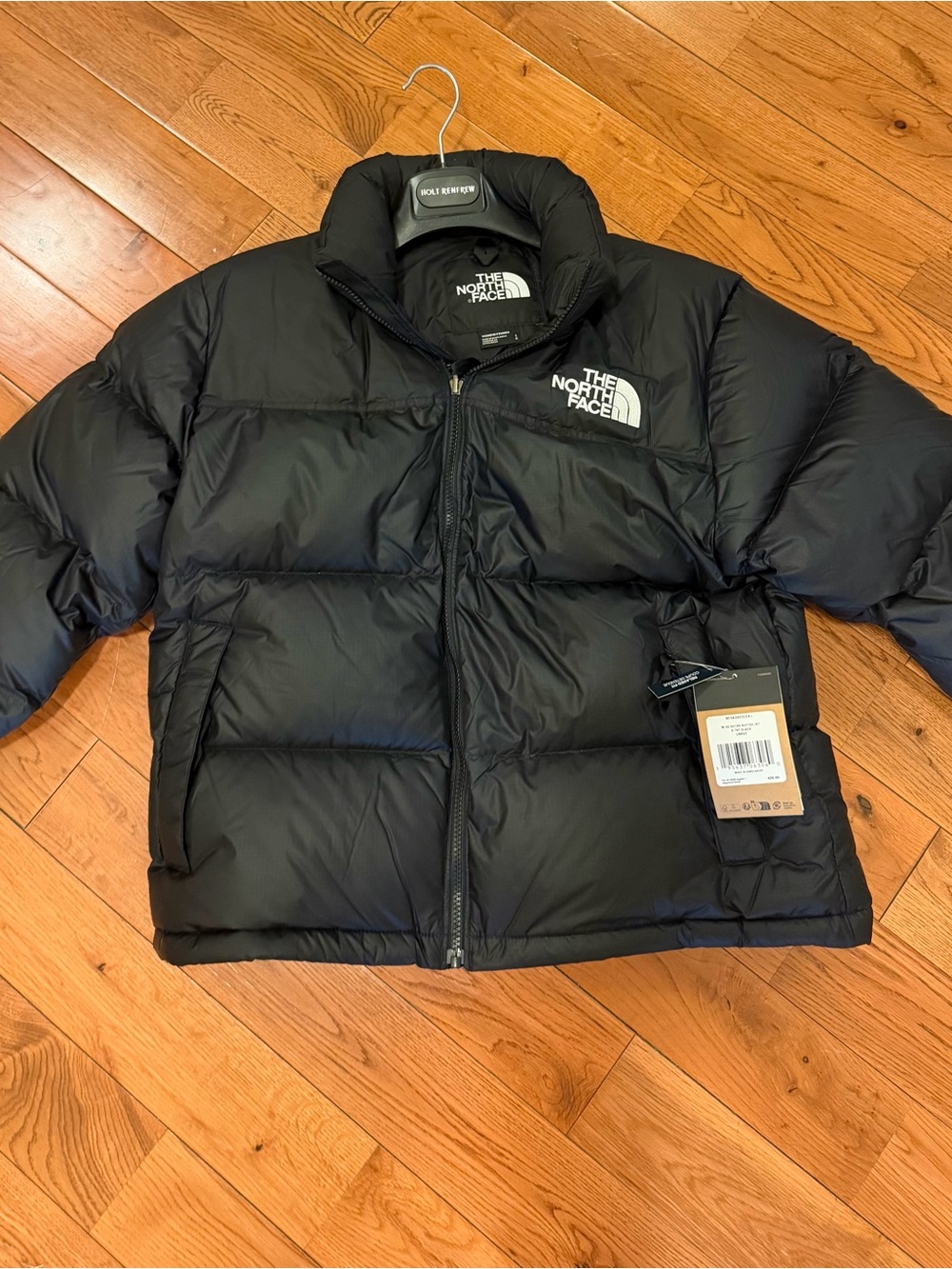 The North Face women’s Black Puffer Jacket with Logo
